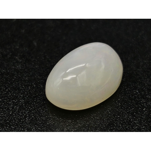 713 - A 3.5ct Natural White Fire Opal. Oval Cabochon. Comes with GLI Certificate.