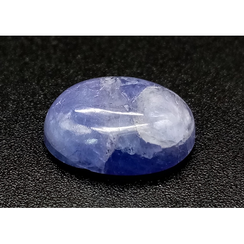 805 - A 7.80 Ct Cabochon Tanzanite. Oval Shape. Comes with GLI Certificate.