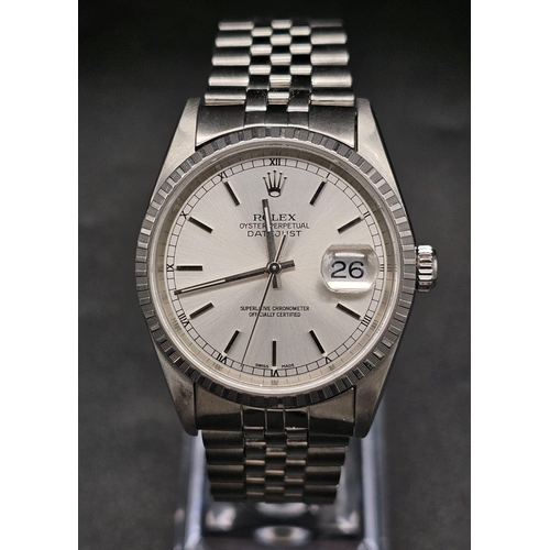 134 - A stainless steel ROLEX Oyster Perpetual Datejust watch. 36 mm case, silver tone face, hour marks an... 