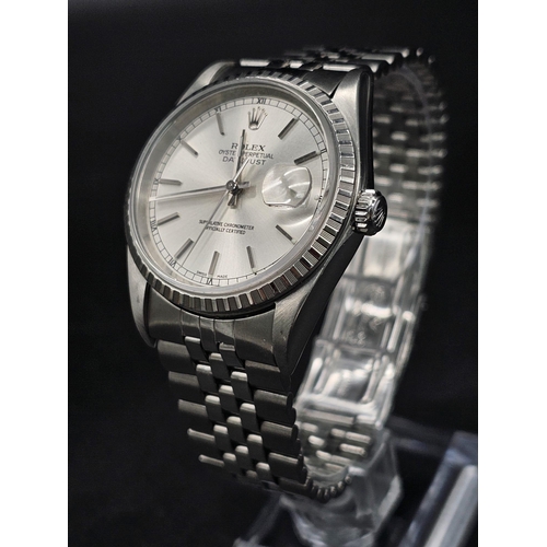 134 - A stainless steel ROLEX Oyster Perpetual Datejust watch. 36 mm case, silver tone face, hour marks an... 