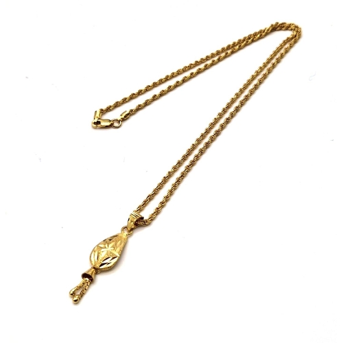 167 - An 18 K yellow gold chain with pendant and assorted earrings. Total weight: 4.6 g REF: 00004369