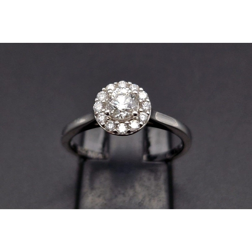 191 - An 18K White Gold Diamond Solitaire Ring. Purchased from Browns diamond store this ring has a centra... 