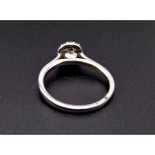 191 - An 18K White Gold Diamond Solitaire Ring. Purchased from Browns diamond store this ring has a centra... 