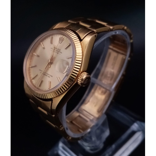 268 - An 18k yellow gold ROLEX Oyster Perpetual Date watch. 31mm case with yellow gold bezel, face, hour m... 