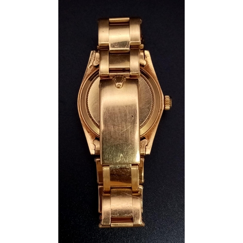 268 - An 18k yellow gold ROLEX Oyster Perpetual Date watch. 31mm case with yellow gold bezel, face, hour m... 