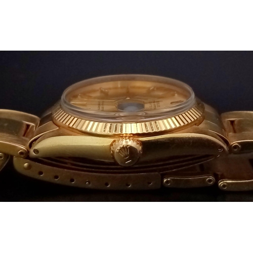 268 - An 18k yellow gold ROLEX Oyster Perpetual Date watch. 31mm case with yellow gold bezel, face, hour m... 