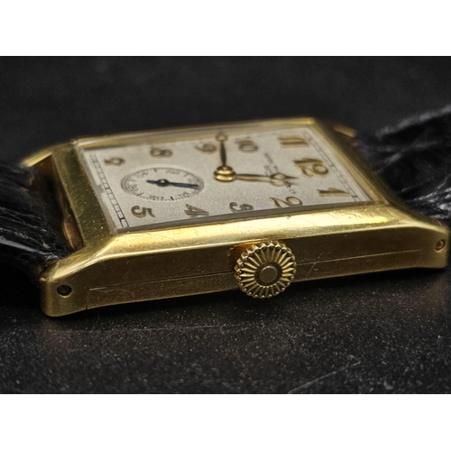 29 - A vintage 18 K yellow gold Patek Philippe watch. 30 x 25 mm  case with gold bezel, cream coloured fa... 