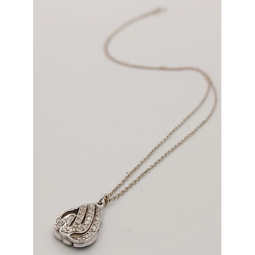 350 - An 18 K white gold diamond pendant with chain A/F. Weight: 2.8 g. REF: 00004387