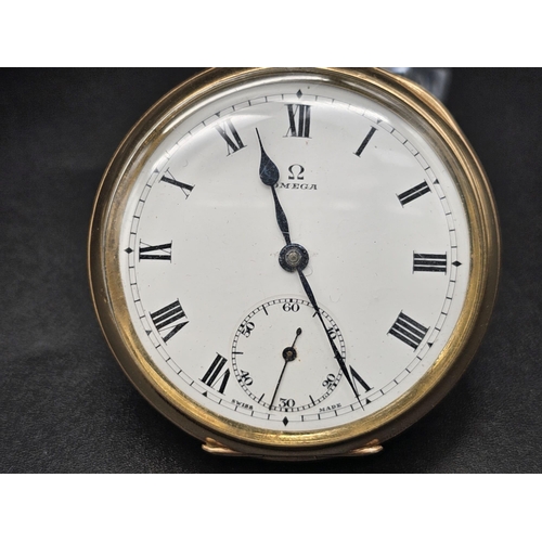 36 - A yellow gold plated OMEGA pocket watch. 50 mm case, white dial with black roman numerals, Inscripti... 