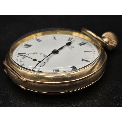 36 - A yellow gold plated OMEGA pocket watch. 50 mm case, white dial with black roman numerals, Inscripti... 