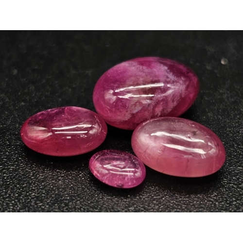 461 - A 10.80ct Natural Madagascar Ruby Lot. Oval Cabochon. Hue Enhanced Earth Mined Rubies.