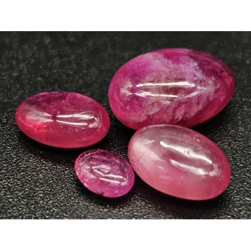 461 - A 10.80ct Natural Madagascar Ruby Lot. Oval Cabochon. Hue Enhanced Earth Mined Rubies.