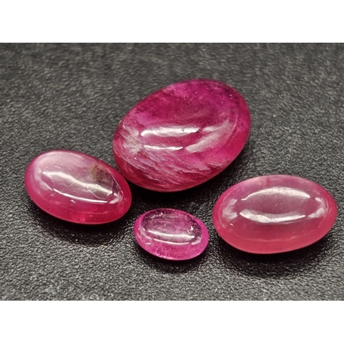 461 - A 10.80ct Natural Madagascar Ruby Lot. Oval Cabochon. Hue Enhanced Earth Mined Rubies.