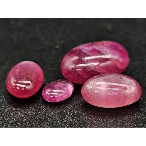 461 - A 10.80ct Natural Madagascar Ruby Lot. Oval Cabochon. Hue Enhanced Earth Mined Rubies.