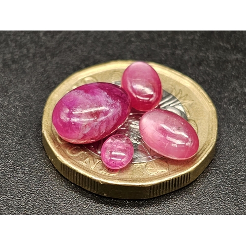 461 - A 10.80ct Natural Madagascar Ruby Lot. Oval Cabochon. Hue Enhanced Earth Mined Rubies.