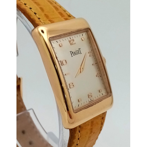 463 - An 18 K rose gold PIAGET watch. 34 x 24 mm case, cream dial with rose gold roman numerals and hands.... 