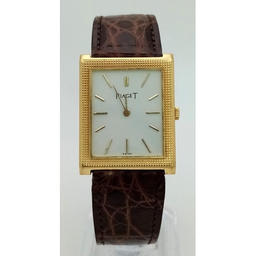 470 - An 18 k yellow gold PIAGET watch. 26 x 24 mm case, white dial with god hour marks and hands. Origina... 