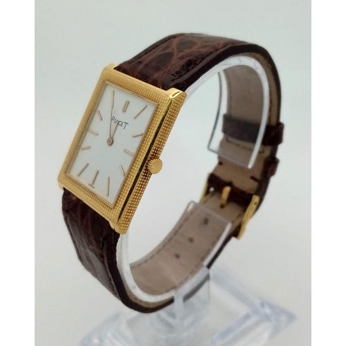 470 - An 18 k yellow gold PIAGET watch. 26 x 24 mm case, white dial with god hour marks and hands. Origina... 