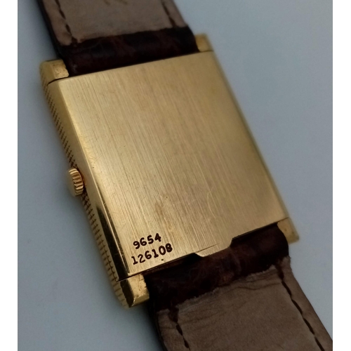 470 - An 18 k yellow gold PIAGET watch. 26 x 24 mm case, white dial with god hour marks and hands. Origina... 