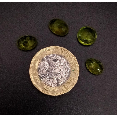 475 - A 10.55ct Natural Pakistan Peridot Lot . Oval Cut. Including 4pcs.