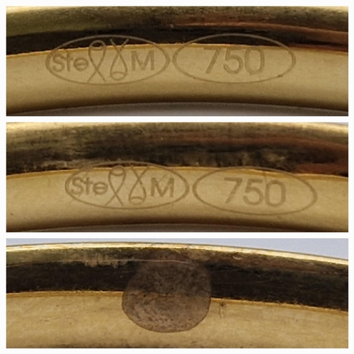 497 - An 18 K yellow gold lot consisting of two bangles with some dents and another engraved bangle. Total... 