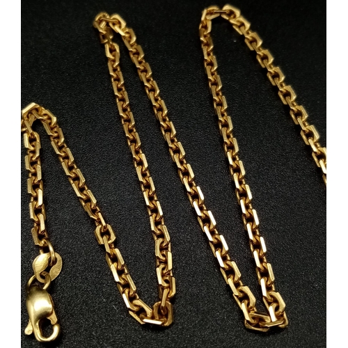 504 - An 18 K yellow gold chain with pendant (weight 17 g) AND a 21 K yellow gold ring size: R, weight: 2.... 