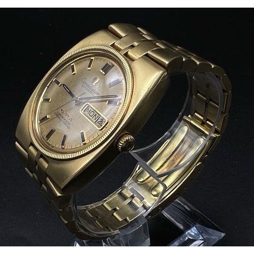 605 - An 18 K yellow gold OMEGA constellation watch. 39 x 36 mm case with gold bezel, face, hour marks and... 