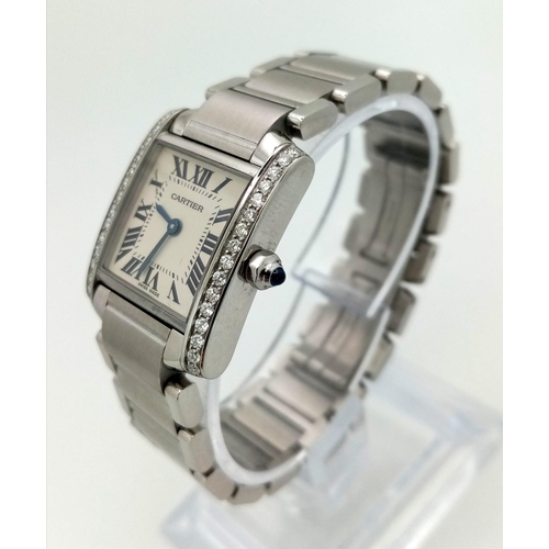 612 - A stainless steel CARTIER watch. 23 x 20 mm case, Bezel with diamonds on two sides, white face with ... 