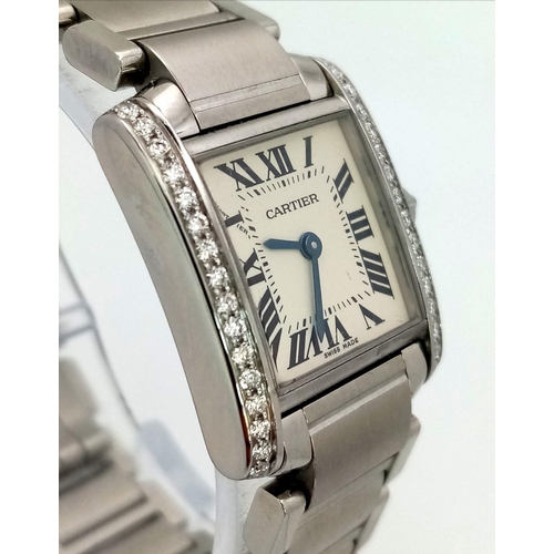 612 - A stainless steel CARTIER watch. 23 x 20 mm case, Bezel with diamonds on two sides, white face with ... 