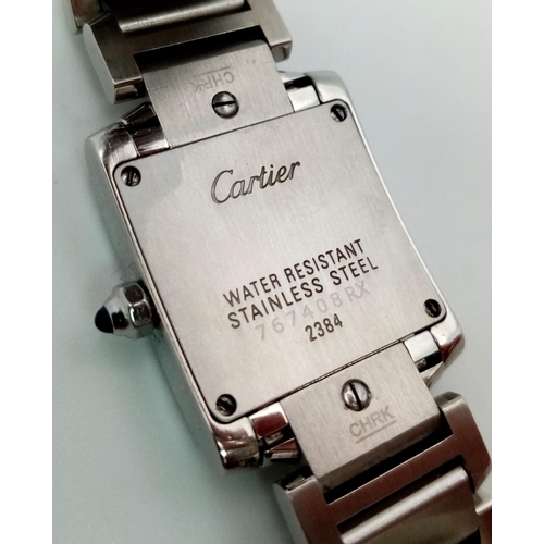 612 - A stainless steel CARTIER watch. 23 x 20 mm case, Bezel with diamonds on two sides, white face with ... 