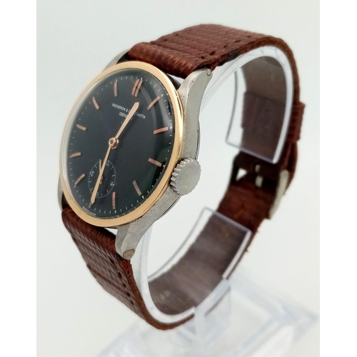 626 - A rare, vintage Two tone Vacheron & Constantin watch. 30 mm case, rose gold tone bezel, black face w... 