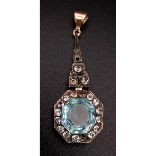 633 - An Art DECO 9 K rose and white gold pendant with an aquamarine and diamonds (one missing). height: 4... 