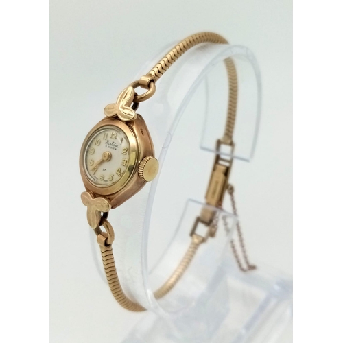 679 - A Vintage 9K Gold Betima Star Ladies Watch. 9K gold bracelet and case - 15mm. Mechanical movement in... 