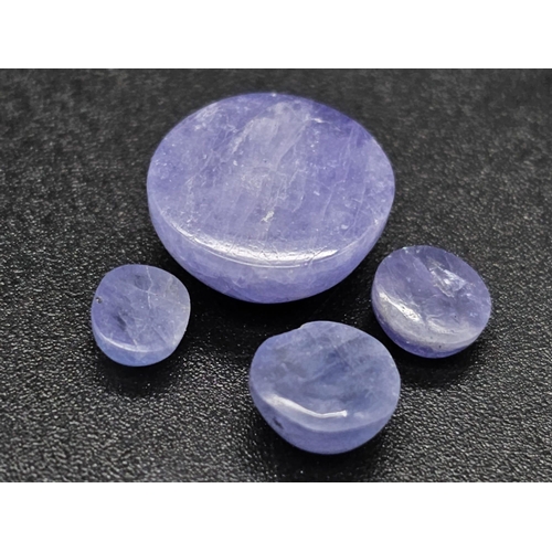 798 - A 15.20ct Natural Tanzanite lot. Including 1 large Round + 3 small mixed shapes. Cabochon cut.