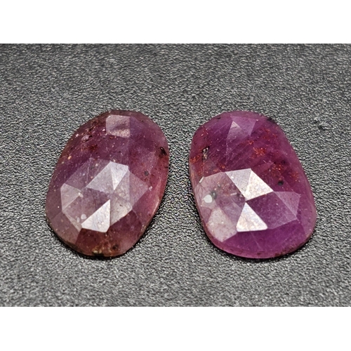 819 - A 11.05 Ct Faceted Ruby Gemstones Pair. Oval Shape. Comes with GLI Certificate.