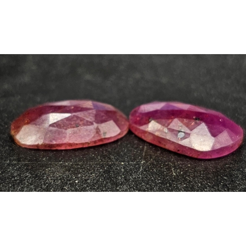 819 - A 11.05 Ct Faceted Ruby Gemstones Pair. Oval Shape. Comes with GLI Certificate.