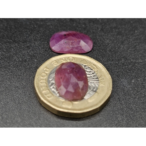 819 - A 11.05 Ct Faceted Ruby Gemstones Pair. Oval Shape. Comes with GLI Certificate.