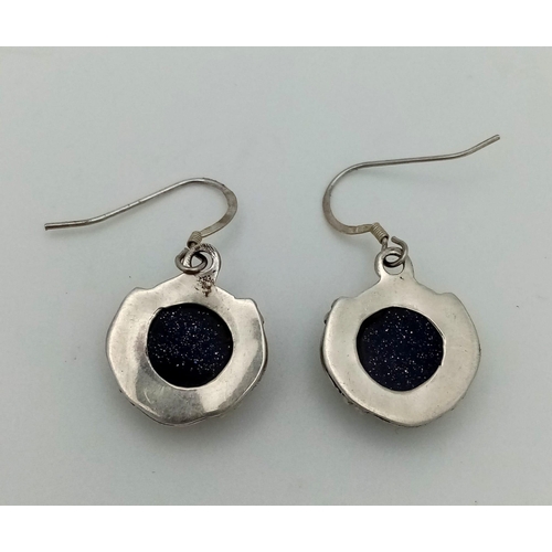 965 - Silver Earrings Sun stone. 6.80g. Size 1.5x2.3 cm.