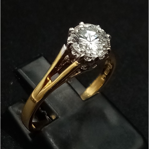 124 - An 18K Yellow Gold Diamond (0.9ct) Solitaire Ring. SI/- F/G round brilliant cut. Size L 1/2. 2.73g t... 