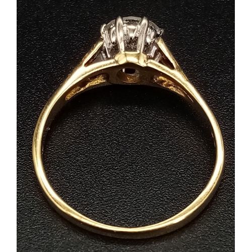 124 - An 18K Yellow Gold Diamond (0.9ct) Solitaire Ring. SI/- F/G round brilliant cut. Size L 1/2. 2.73g t... 