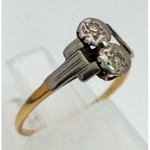 1298 - A Vintage 18K Gold, Platinum and Diamond Ring. Size J 1/2.
1.4g total weight.