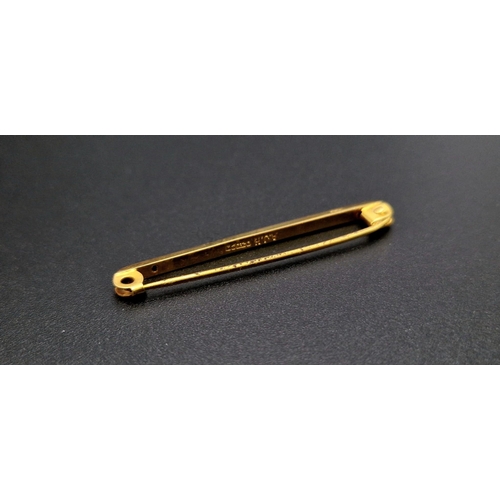 1451 - A 9K Yellow Gold Safety Pin Brooch. UK hallmark. 4cm. 0.8g