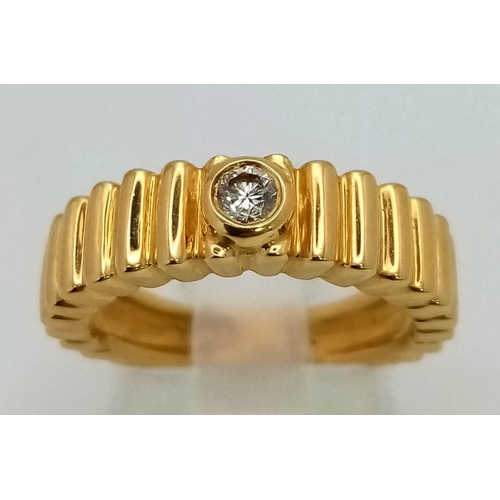 169 - A Fabulously Different 18K Yellow Gold and Diamond Solitaire Ring. A beautiful quality 0.2ct diamond... 