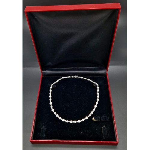 27 - An Elegant 18K White Gold Diamond Necklace. Over 11.5ct of quality diamonds create the perfect piece... 