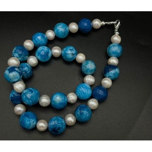 315 - A Dragons Breath Blue Agate and Cultured Pearl Necklace. Agate - 12mm beads. 44cm