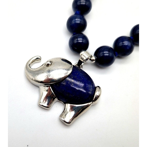 505 - A Lapis Lazuli Elephant Pendant and Beaded Necklace. 4cm and 44cm. Beads -10mm.