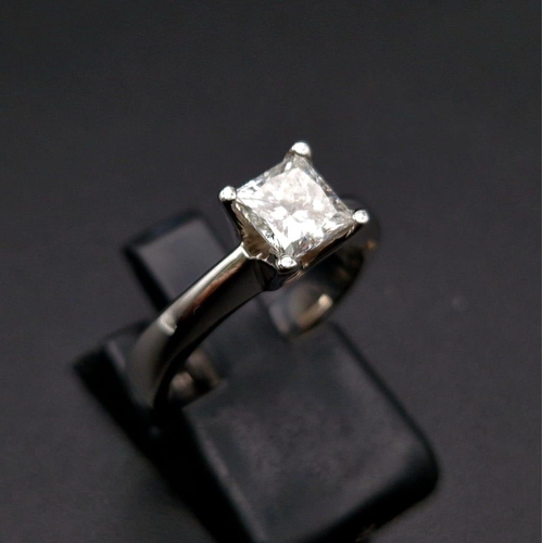 96 - A 14K White Gold Princess Cut Diamond (0.90ct) Solitaire Ring. Sl 1 - G clarity and colour. Size J. ... 