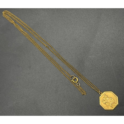 974 - A 9K Gold St. Christopher Pendant on a 9K Gold Necklace.
2cm and 50cm. 6.03g total weight.