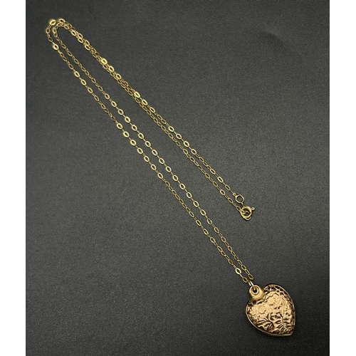 1313 - A 9K Yellow Gold Heart-Shaped Pendant on a 9K yellow gold disappearing necklace. 2cm and 44cm. 1.37g... 