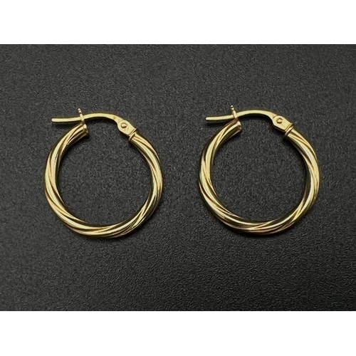 1777 - A Pair of 9K Yellow Gold Hoop Earrings. Twist design. 0.81g